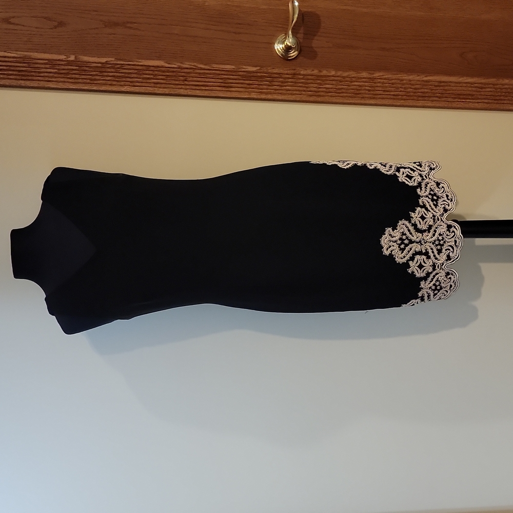 Little black dress (LBD) with lace trim on bottom, Maggie London. Lovely